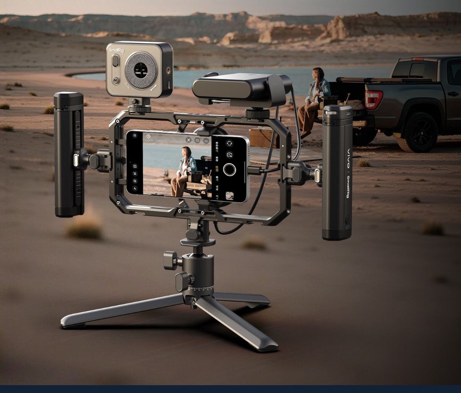 TVU Pocket mounted in a full cage rig with monitor, light and grips for field use